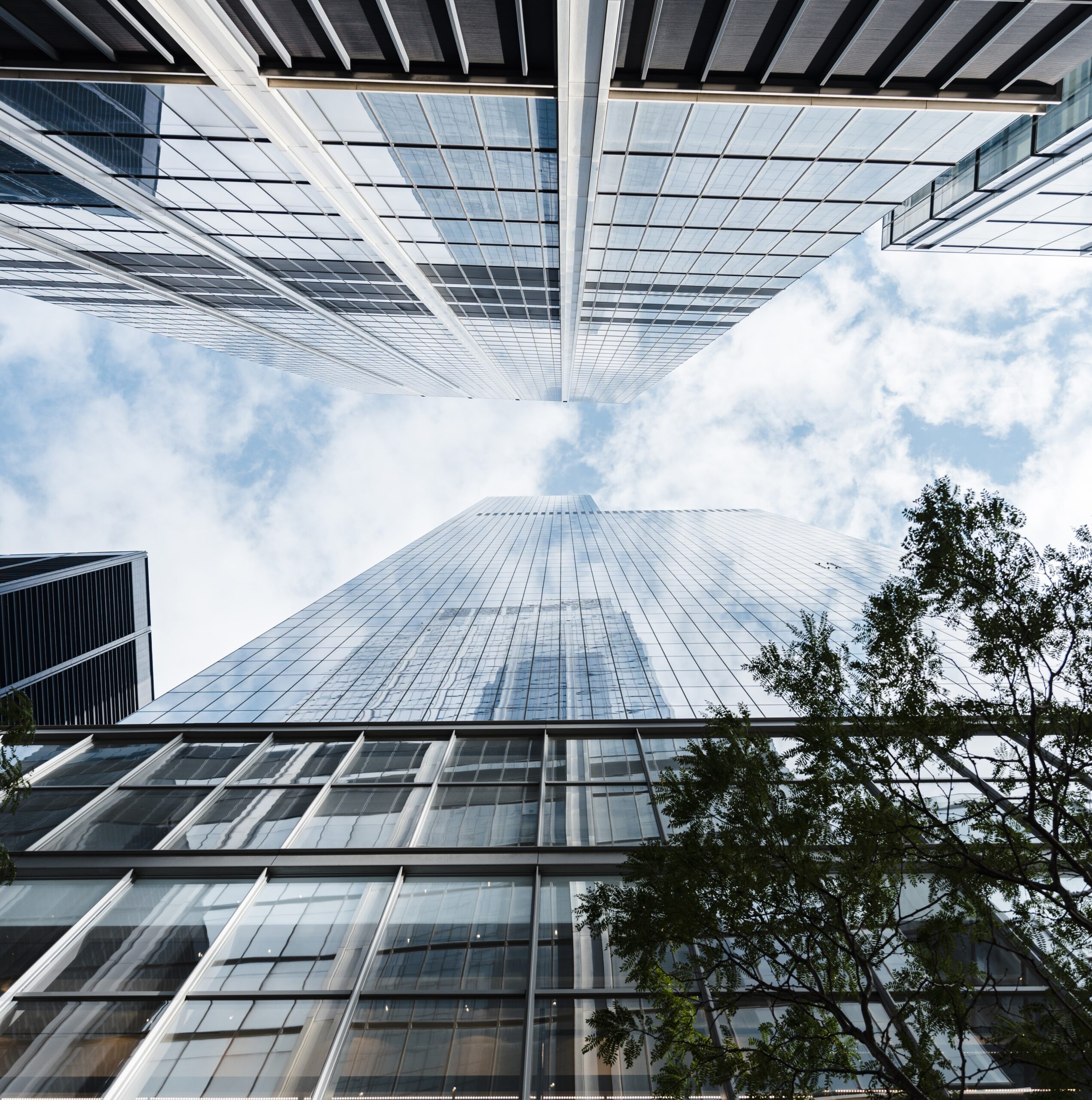 b33ottom-view-skyscrapers-sunny-day-scaled.jpg